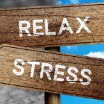 Sign With Relax And Stress Pointing In Different Directions